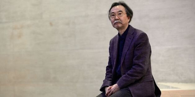 TO GO WITH AFP INTERVIEW by Karyn NISHIMURA-POUPEE Japanese cartoonist Jiro Taniguchi poses on January 26, 2015 at the Louvre museum in Paris. Jiro Taniguchi, creator of more than 40 mangas including The Walking Man, A Distant Neighborhood, is a guest of the Angouleme International Comics Festival. AFP PHOTO / STEPHANE DE SAKUTIN (Photo credit should read STEPHANE DE SAKUTIN/AFP/Getty Images)