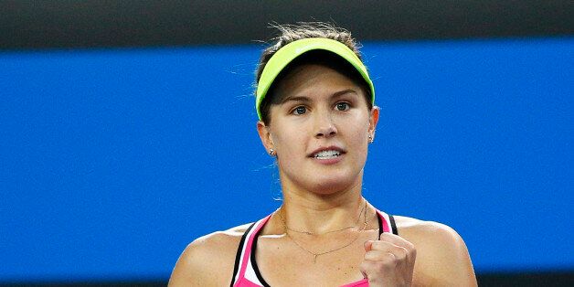 Eugenie Bouchard of Canada celebrates winning against Anna-Lena Friedsam of Germany after their women's singles first round match at the Australian Open 2015 tennis tournament in Melbourne January 19, 2015. REUTERS/Athit Perawongmetha (AUSTRALIA - Tags: SPORT TENNIS)
