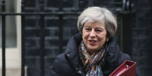 Britain's Prime Minister Theresa May leaves 10 Downing Street in central London on January 25, 2017 to attend the weekly Prime Minister's Questions in the House of Commons.May was set to answer MP's question at Parliament a day after The Supreme Court's landmark ruling that the government must win parliament's approval before starting talks for Britain to leave the European Union. May will this week be the first foreign leader to meet with Donald Trump since his inauguration, aiming to discuss a key post-Brexit trade deal with the US. / AFP / Daniel LEAL-OLIVAS (Photo credit should read DANIEL LEAL-OLIVAS/AFP/Getty Images)