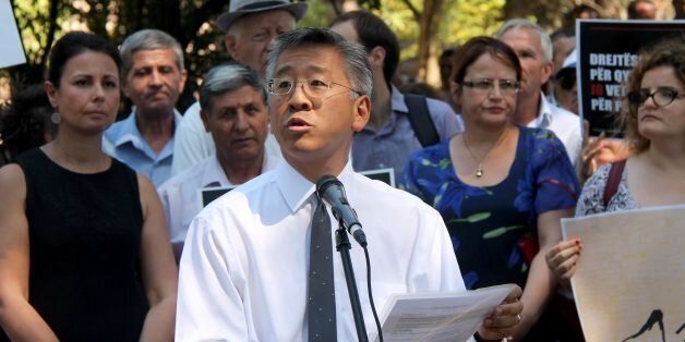 U.S ambassador to Albania Donald Lu (C) speaks during a civil society rally in Tirana on July 19, 2016.Lu warned that Washington will take action against politicians who do not vote for a judicial reform agreement, considered key to convincing the European Union to launch membership negotiations with the Balkan country. / AFP / STRINGER (Photo credit should read STRINGER/AFP/Getty Images)