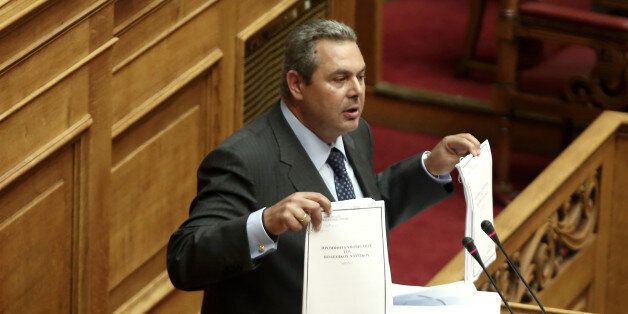 Defence Minister Panos Kammenos addresses lawmakers at Parliament during a plenary session on corruption, in Athens on October 10, 2016 (Photo by Panayiotis Tzamaros/NurPhoto via Getty Images)