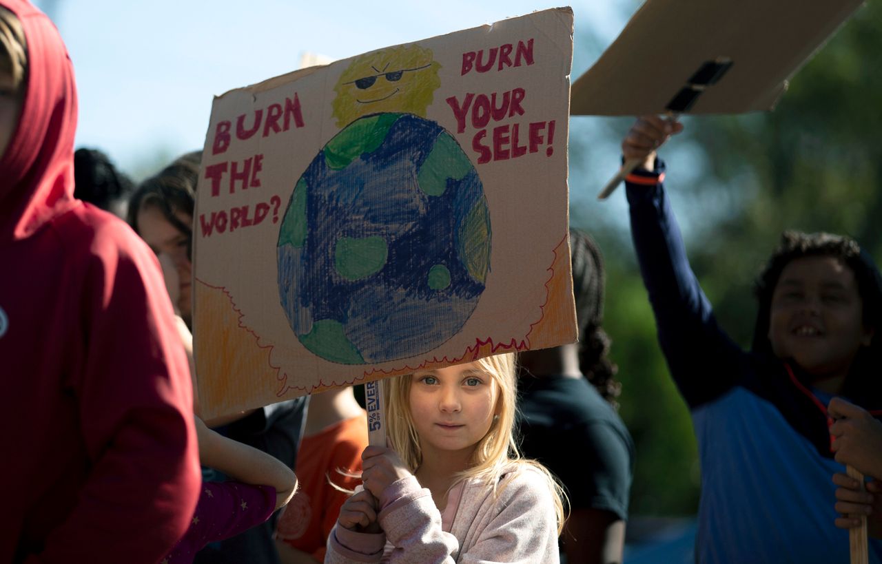 ign while participating in a "Global Climate Strike" at the Experiential School of Greensboro in Greensboro, N.C., on Friday, Sept. 20, 2019. 