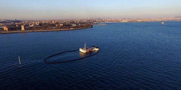 ISTANBUL, TURKEY - FEBRUARY 01: Sorbent boom circle to control spreading the pollution after a Tanzanian dry cargo vessel sank in the Sea of Marmara, on the shore of Zeytinburnu, Istanbul on February 01, 2017. (Photo by Lokman Akkaya/Anadolu Agency/Getty Images)