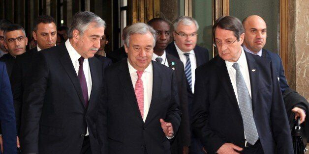 GENEVA, SWITZERLAND - JANUARY 12: Secretary General of the United Nations (UN) Antonio Guterres (C), Turkish Cypriot leader Mustafa Akinci (L) and Greek Cypriot leader Nicos Anastasiades (R) are seen during the fourth day of Cyprus talks at United Nations Office in Geneva, Switzerland on January 12, 2017. (Photo by Presidency of Turkish Cypriot / Artun Korudag/Anadolu Agency/Getty Images)