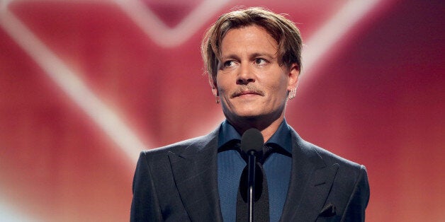 LOS ANGELES, CA - JANUARY 18: Actor Johnny Depp accepts the Favorite Movie Icon award onstage during the People's Choice Awards 2017 at Microsoft Theater on January 18, 2017 in Los Angeles, California. (Photo by Christopher Polk/Getty Images for People's Choice Awards)