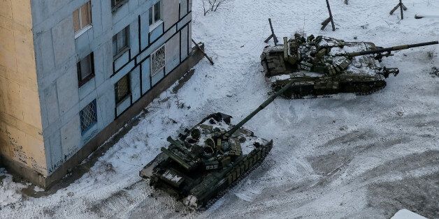Tanks are seen in the government-held industrial town of Avdiyivka, Ukraine February 1, 2017. REUTERS/Gleb Garanich TPX IMAGES OF THE DAY