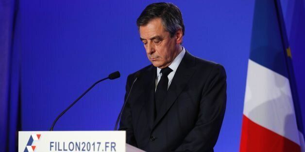 French presidential election candidate for the right-wing Les Republicains (LR) party Francois Fillon reacts as he gives a press conference focused on 'fake job' allegations, on February 6, 2017 at his campaign headquarters in Paris.Fillon's presidential bid has been floundering since it emerged that his wife Penelope earned more than 800,000 euros ($860,000) over a decade as a parliamentary aide to her husband and an ally. / AFP / POOL / PHILIPPE WOJAZER (Photo credit should read PHILIPP