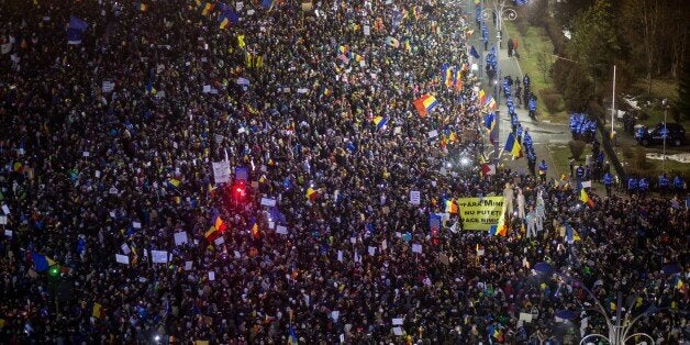 This picture shows a large view of people protesting against the Romanian government's contentious corruption decree in front of the government headquarters at the Victoriei square in Bucharest on February 5, 2017.Romania's government formally repealed contentious corruption legislation that has sparked the biggest protests since the fall of dictator Nicolae Ceausescu in 1989, ministerial sources said. The emergency decree, announced on Tuesday (January 31, 2017), would have decriminalised certa