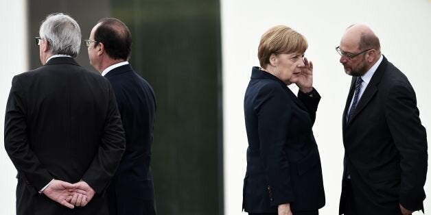 (LtoR) European Commission President Jean Claude Juncker, French President Francois Hollande, German Chancellor Angela Merkel and President of European Parliament Martin Schulz talk during a remembrance ceremony to mark the centenary of the battle of Verdun, at the Douaumont Ossuary (Ossuaire de Douaumont), northeastern France, on May 29, 2016. The battle of Verdun, in 1916, was one of the bloodiest episodes of World War I. The offensive which lasted 300 days claimed more than 300,000 lives. / AFP / FREDERICK FLORIN (Photo credit should read FREDERICK FLORIN/AFP/Getty Images)