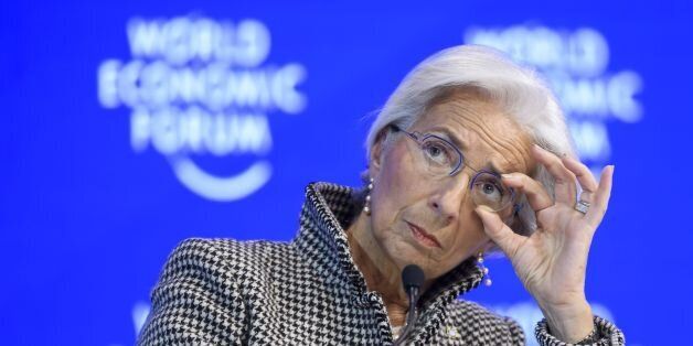 International Monetary Fund (IMF) managing director Christine Lagarde adjusts her glasses as she attends a session on the second day of the World Economic Forum, on January 18, 2017 in Davos.With the world's elite holding its breath until Donald Trump becomes the next US president, outgoing Vice-President Joe Biden addresses the World Economic Forum in Davos / AFP / FABRICE COFFRINI (Photo credit should read FABRICE COFFRINI/AFP/Getty Images)