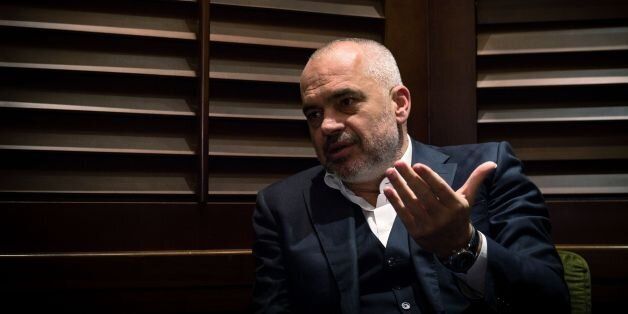 Albanian Prime Minister Edi Rama gestures during an interview in Belgrade on October 13, 2016. Serbia should recognise its former southern province Kosovo, which 'is a state,' Rama said on October 13 during a visit to Belgrade. 'It is over, Kosovo is a state, it is a state recognized by major world powers,' Rama told AFP, adding that 'people made their choice'. Kosovo unilaterally declared independence from Serbia in 2008, a decade after the end of the 1998-1999 war, but Belgrade, backed by its traditional ally Russia, has refused to recognise the move. / AFP / Andrej ISAKOVIC (Photo credit should read ANDREJ ISAKOVIC/AFP/Getty Images)
