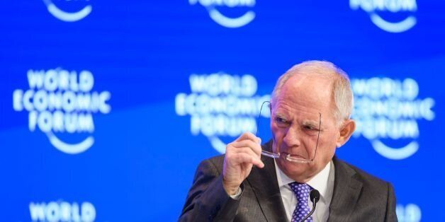 German Finance Minister Wolfgang Schaeuble gestures during a session on the closing day of the World...