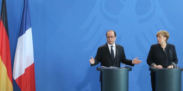 German Chancellor Angela Merkel (R) and French President Francois Hollande attend a joint press conference prior to talks in the chancellery in Berlin on January 27, 2017. / AFP / Adam BERRY (Photo credit should read ADAM BERRY/AFP/Getty Images)