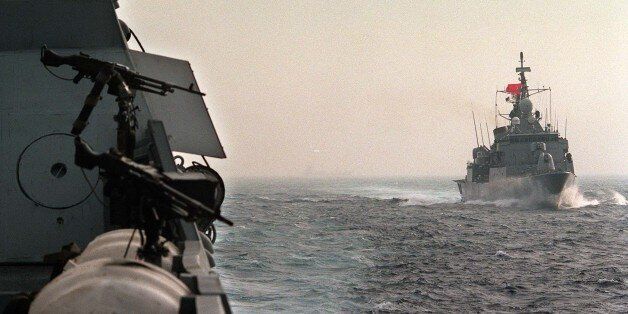 A Turkish missile boat passes the Israeli missile boat Achi Lahav during joint manoeuvres in the Mediterranean Sea January 7. U.S., Israeli and Turkish warships completed a search-and-rescue exercise that irate Arab states and Iran branded ominous and aggressive.ISRAEL USA TURKEY