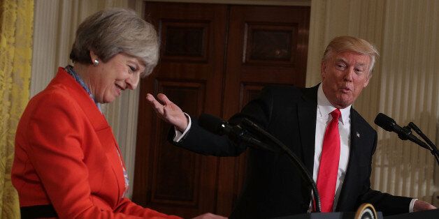 WASHINGTON, DC - JANUARY 27: U.S. President Donald Trump (R) and British Prime Minister Theresa May (L) participate in a joint press conference in the East Room of the White House January 27, 2017 in Washington, DC. Prime Minister May is on a visit to the White House and had a bilateral meeting in the Oval Office with President Trump. (Photo by Alex Wong/Getty Images)