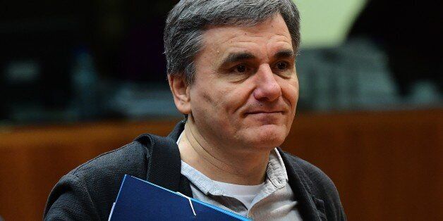 Greece's Finance Minister Euclid Tsakalotos attends an Economic and Financial (ECOFIN) Affairs Council meeting at the European Council, in Brussels, on December 6, 2016. / AFP / EMMANUEL DUNAND (Photo credit should read EMMANUEL DUNAND/AFP/Getty Images)