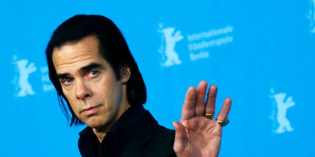 Cast member Nick Cave poses during a photocall promoting the movie