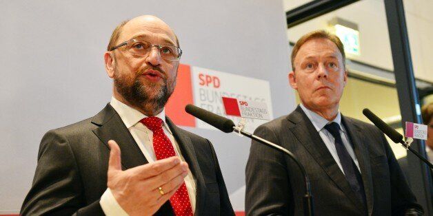 BERLIN, GERMANY - JANUARY 25: SPD politician and designated party's chairman Martin Schulz (L) , and German Social Democrats (SPD) Bundestag faction leader Thomas Oppermann attend a faction meeting of the German Social Democrats at the Reichstag building, host of the German federal parliament, Bundestag, in Berlin, Germany, on January 25, 2017. (Photo by Maurizio Gambarini/Anadolu Agency/Getty Images)