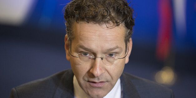 Jeroen Dijsselbloem, Dutch finance minister and head of the group of euro-area finance ministers, speaks to members of the media ahead of a Eurogroup meeting of European finance ministers in Brussels, Belgium, on Monday, Dec. 5, 2016. Since Greece's debt triggered a wave of shocks that spooked investors in Europe more than six years ago, EU governments -- led by Angela Merkel's Germany, the bloc's largest economy -- have been pursuing an austerity-first agenda; not only raising taxes, slashing spending and striving to narrow deficits themselves but demanding other nations do likewise. Photographer: Jasper Juinen/Bloomberg via Getty Images