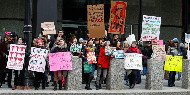 Anti-Trump demonstrators protest at abortion rights rally in Chicago, Illinois, January 15, 2017. REUTERS/Kamil Krzaczynski