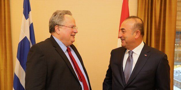 NEW YORK, UNITED STATES - JANUARY 6: Turkish Foreign Minister Mevlut Cavusoglu (R) meets Greek Foreign Minister Nikos Kotzias (L) in New York, USA on January 6, 2017. (Photo by Turkish Foreign Ministry / Ahmet Gumus/Anadolu Agency/Getty Images)