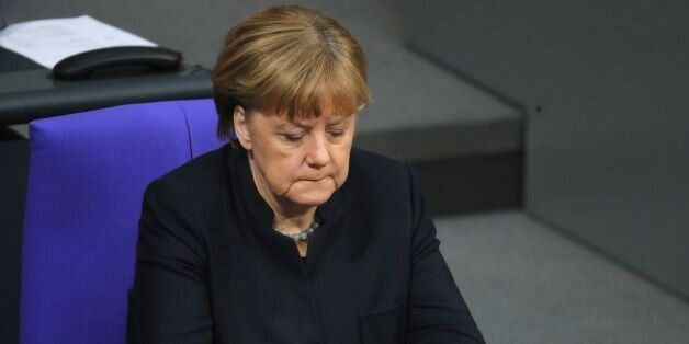 German Chancellor Angela Merkel (CDU) sits in the Bundestag (Lower house of parliament) in Berlin on January 19, 2017, as the members of the GermanÂ Bundestag commemorate the victims of the terrorist attack on Breitscheidplatz.On December 19, 2016 a man drove a truck into the Christmas market on Breitscheidplatz inÂ Berlin, killing a total of 12 people and severely injuring several others. / AFP / dpa / Kay Nietfeld / Germany OUT (Photo credit should read KAY NIETFELD/AFP/Getty Images)
