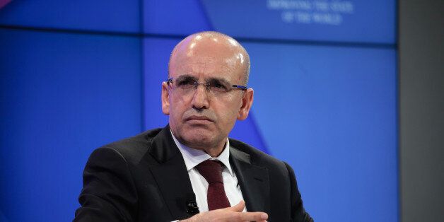Mehmet Simsek, Turkey's deputy prime minister, pauses during a panel session at the World Economic Forum (WEF) in Davos, Switzerland, on Thursday, Jan. 19, 2017. World leaders, influential executives, bankers and policy makers attend the 47th annual meeting of the World Economic Forum in Davos from Jan. 17 - 20. Photographer: Jason Alden/Bloomberg via Getty Images