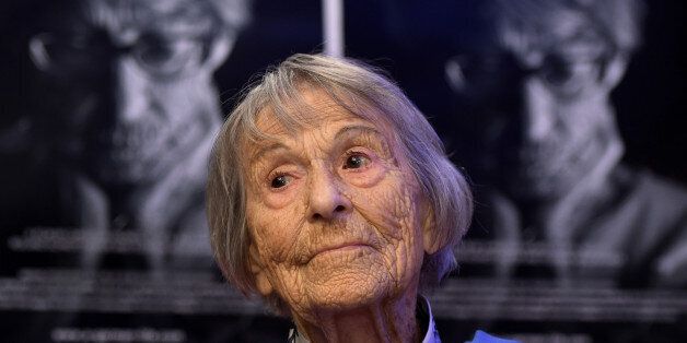 Brunhilde Pomsel, former secretary of Nazi propaganda chief Joseph Goebbels, sits on a cinema chair in front of posters for the movie 'A German life' in a cinema in Munich, southern Germany, on June 29, 2016. / AFP / CHRISTOF STACHE (Photo credit should read CHRISTOF STACHE/AFP/Getty Images)