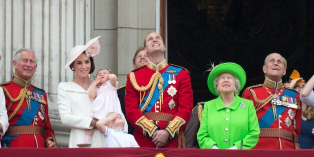 LONDON, ENGLAND - JUNE 11: Prince Charles, Prince of Wales, Catherine, Duchess of Cambridge, Princess Charlotte, Prince George, Prince William, Duke of Cambridge, Queen Elizabeth II and Prince Philip, Duke of Edinburgh stand on the balcony of Buckingham Palace during the Trooping the Colour, this year marking the Queen's 90th birthday at The Mall on June 11, 2016 in London, England. The ceremony is Queen Elizabeth II's annual birthday parade and dates back to the time of Charles II in the 17th Century when the Colours of a regiment were used as a rallying point in battle. (Photo by Zak Hussein - Corbis/Corbis via Getty Images)