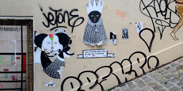 detail of graffiti painted illegally on public wall in Montmartre,Paris,France,Europe