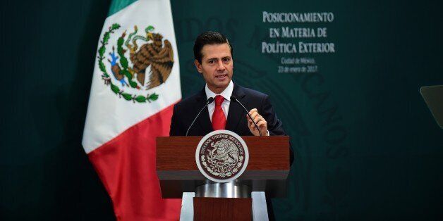 Mexican President Enrique Pena Nieto gives a foreign policy speech after US President Donald Trump vowed to start renegotiating North American trade ties, in Mexico City on January 23, 2017.Trump's vows to scrap the North American Free Trade Agreement to protect US jobs have raised concern in Mexico, which sends most of its exports to the United States. Pena Nieto's office said he congratulated Trump on taking office in a phone call Saturday and that both had agreed to open a 'new dialogue.' / AFP / Ronaldo SCHEMIDT (Photo credit should read RONALDO SCHEMIDT/AFP/Getty Images)