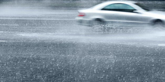 motion blur of driving car on a wet street