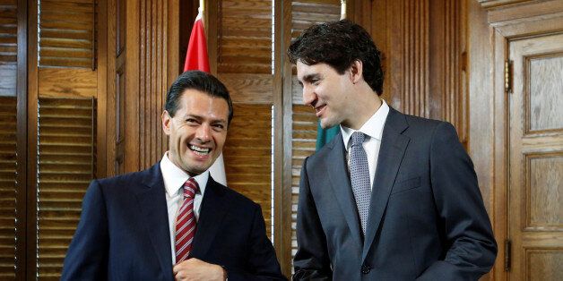 Canada's Prime Minister Justin Trudeau (R) meets with Mexico's President Enrique Pena Nieto in Trudeau's office on Parliament Hill in Ottawa, Ontario, Canada, June 28, 2016. REUTERS/Chris Wattie