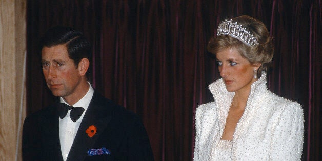 HONG KONG - NOVEMBER 10: Prince Charles, Prince of Wales and Diana, Princess of Wales, wearing the Cambridge Lover's Knot tiara and a white outfit by Catherine Walker known as the 'Elvis Look', attend an event during a tour of Hong Kong on November 10, 1989 in Hong Kong. (Photo by Anwar Hussein/Getty Images)