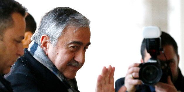 Turkish Cypriot leader Mustafa Akinci arrives for the Cyprus reunification talks at the United Nations in Geneva, Switzerland January 10, 2017. REUTERS/Denis Balibouse