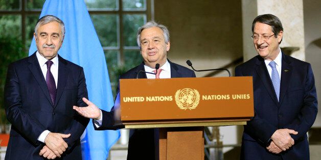 United Nations Secretary General Antonio Guterres addresses a news conference next to Cypriot President Nicos Anastasiades (R) and Turkish Cypriot leader Mustafa Akinci after the Conference on Cyprus at the European headquarters of the United Nations in Geneva, Switzerland, January 12, 2017. REUTERS/Pierre Albouy