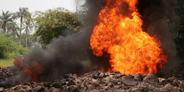 Fire burns on the Shell Petroleum Development Company Trans Niger pipeline (TNP) at Mogho, Gokana, Rivers state, Nigeria January 5, 2017. REUTERS/Afolabi Sotunde