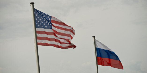 Torgau, Germany - May 12: National Flags of USA and Russia on May 12, 2015 in Torgau, Germany. (Photo by Michael Gottschalk/Photothek via Getty Images)