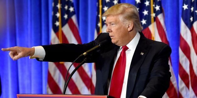US President-elect Donald Trump speaks during a press conference January 11, 2017 at Trump Tower in New York.Trump held his first news conference in nearly six months Wednesday, amid explosive allegations over his ties to Russia, a little more than a week before his inauguration. / AFP / Timothy A. CLARY (Photo credit should read TIMOTHY A. CLARY/AFP/Getty Images)