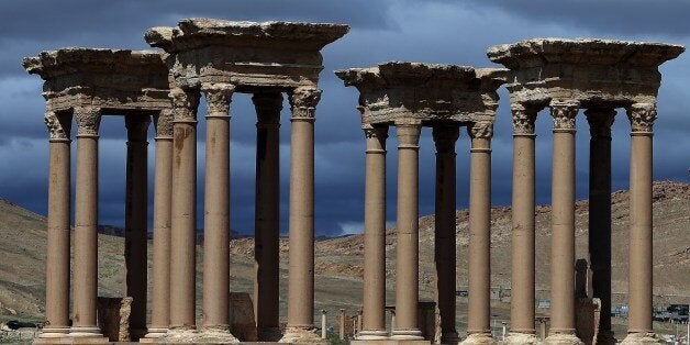 A picture taken on March 14, 2014 shows the he Tetrapylon (Monumental Entrance), which was reconstructed after 1963 by the Directorate of Antiquities of Syria, in the ancient oasis city of Palmyra, 215 kilometres northeast of Damascus. From the 1st to the 2nd century, the art and architecture of Palmyra, standing at the crossroads of several civilizations, married Graeco-Roman techniques with local traditions and Persian influences. AFP PHOTO/JOSEPH EID (Photo credit should read JOSEPH EID/AFP/Getty Images)