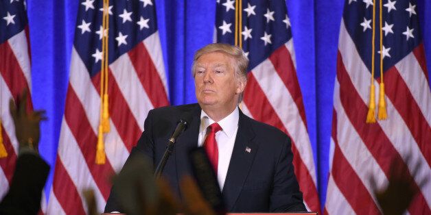 US President-elect Donald Trump answers journalists questions during a press conference on January 11, 2017 in New York.Donald Trump is holding his first news conference in nearly six months Wednesday, amid explosive allegations over his ties to Russia, a little more than a week before his inauguration. / AFP / DON EMMERT (Photo credit should read DON EMMERT/AFP/Getty Images)
