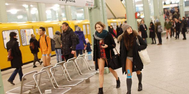 People take part in the annual 'No Pants Subway Ride' in Berlin, Germany, January 8, 2017. REUTERS/Hannibal Hanschke