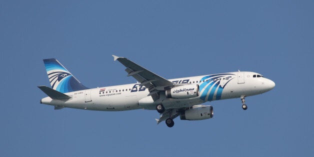 Doha, Qatar - January 8, 2012: Egypt Air Airbus A320-200 on the final approach to Doha International Airport. Egypt Air is the flag carrier airline of Egypt based at Cairo International Airport. The Airline operates scheduled passenger and freight services to more than 75 destinations in the Middle East, Europe, Africa, Asia, and the Americas