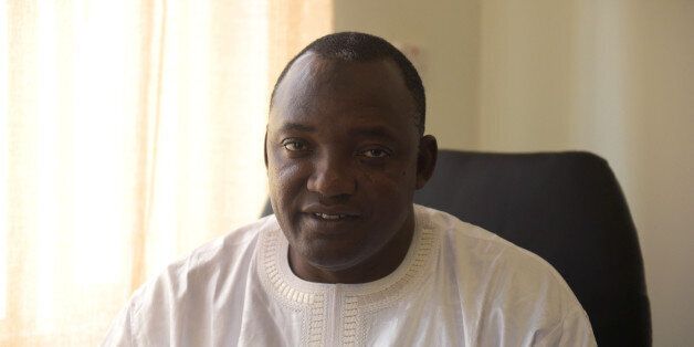 Gambia's President-elect Adama Barrow poses in his office in Serekunda, on December 11, 2016. Gambia's incumbent head of state Yahya Jammeh will contest in court the election victory handed to opposition candidate Adama Barrow, his party has said. Barrow on Saturday called on Jammeh to drop his challenge, while the UN, US and other foreign authorities lambasted Jammeh and urged Gambians to keep the peace. / AFP / SEYLLOU (Photo credit should read SEYLLOU/AFP/Getty Images)