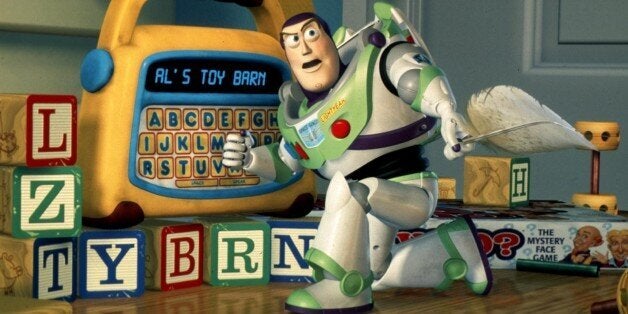 ATTENTION: THIS PICTURE HAS BEEN BINNED, DO NOT USE. UNDATED PUBLICITY PHOTO - FOR USE WITH STORY LEISURE-MOVIES - Buzz Lightyear uses a toy to plan a daring rescue of his pal Woody in Disney/Pixar's new computer animated comedy adventure film