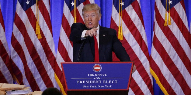 U.S. President-elect Donald Trump argues with a reporter during a news conference in the lobby of Trump Tower in Manhattan, New York City, U.S., January 11, 2017. REUTERS/Lucas Jackson TPX IMAGES OF THE DAY