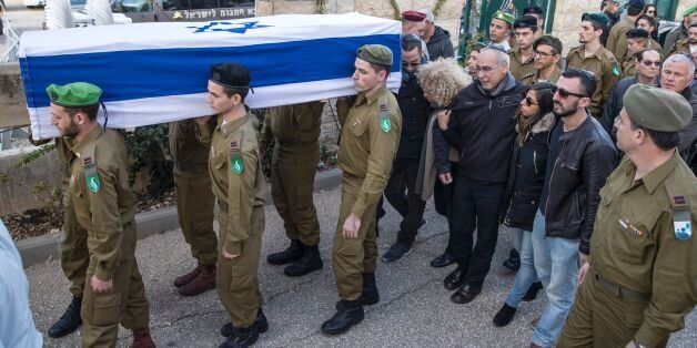Israeli security forces carry the coffin of 20-year-old Israeli soldier Yael Yekutiel, on January 9, 2017 during her funeral at Kiryat Shaul military cemetery in the Israeli coastal city of Tel Aviv. A Palestinian rammed a truck into a group of Israeli soldiers visiting a popular tourist spot in Jerusalem on January 8, killing four and wounding 17 others. / AFP / JACK GUEZ (Photo credit should read JACK GUEZ/AFP/Getty Images)