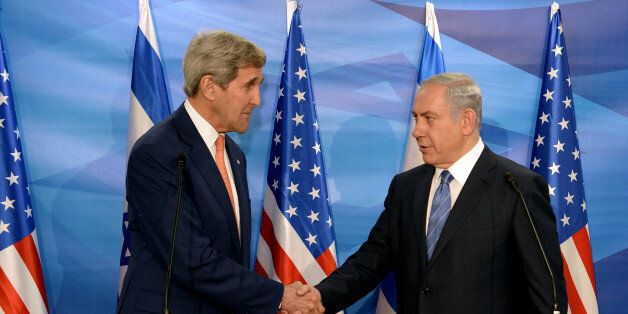 JERUSALEM, Nov. 24, 2015 -- Israeli Prime Minister Benjamin Netanyahu, right, shakes hands with visiting U.S. Secretary of State John Kerry in Jerusalem, on Nov. 24, 2015. Kerry arrived here on Tuesday morning to pay a visit to Israel and the West Bank in hopes of curtailing the two-month long wave of violence. (Xinhua/U.S. Embassy to Israel/Matty Stern via Getty Images)