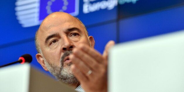 European Economic and Financial Affairs Commissioner Pierre Moscovici attends a news conference after an eurozone finance ministers meeting (Eurogroup) in Luxembourg, October 5, 2015. REUTERS/Eric Vidal