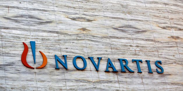 A Novartis logo is pictured on its headquarters building in Mumbai April 1, 2013. REUTERS/Vivek Prakash/File Photo